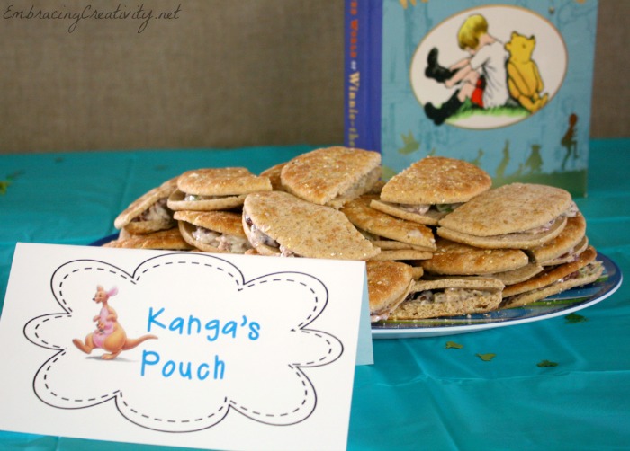 http://embracingcreativity.net/wp-content/uploads/2014/03/Winnie-the-Pooh-Party-Kangas-Pouch-1.jpg